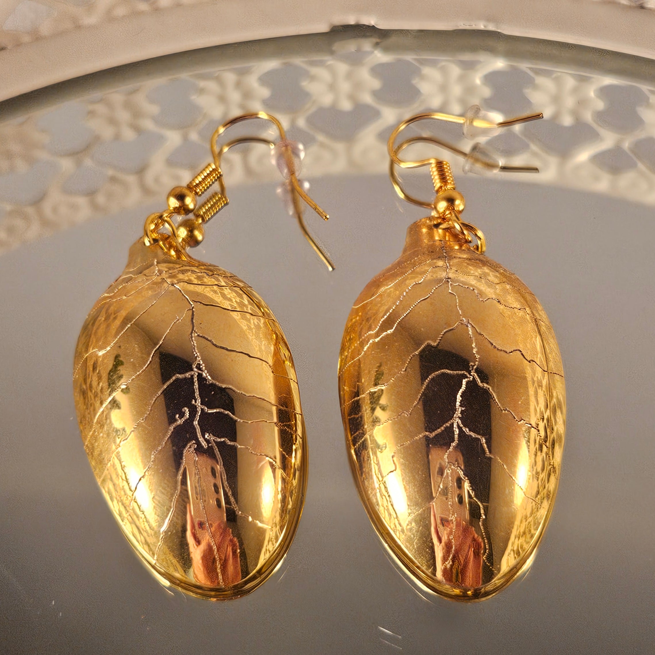Boucles d'oreilles "petites feuilles" dorées