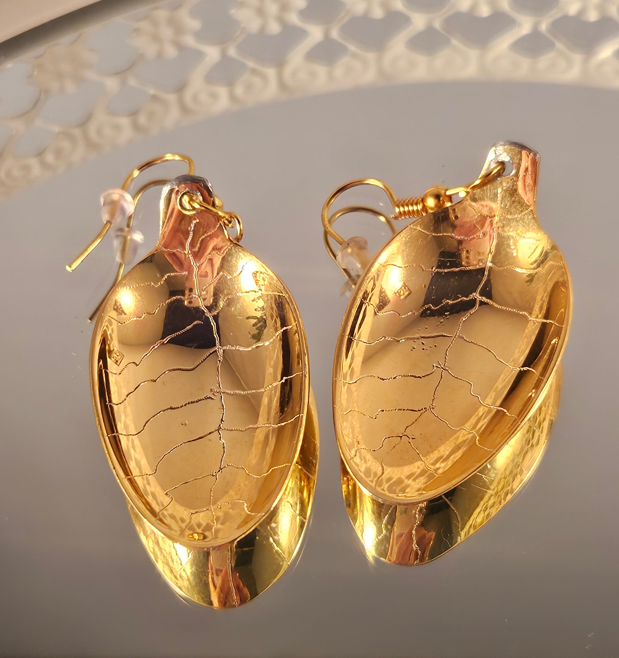 Boucles d'oreilles "petites feuilles" dorées